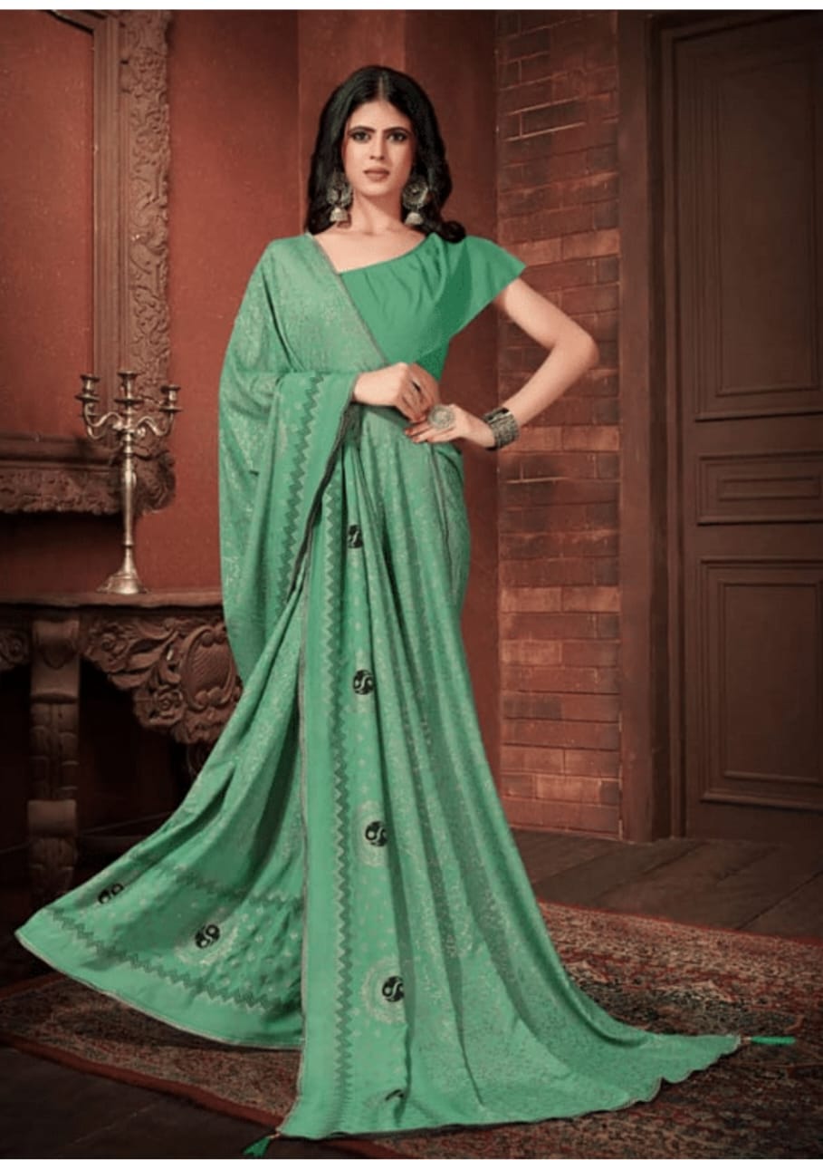 Elegant chiffon saree with smooth, flowing drapes, adding a graceful touch to any occasion.