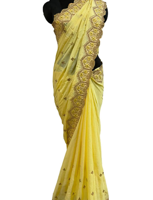 Traditional Kanjivaram silk saree with a heavy pallu and gold zari border, perfect for brides.