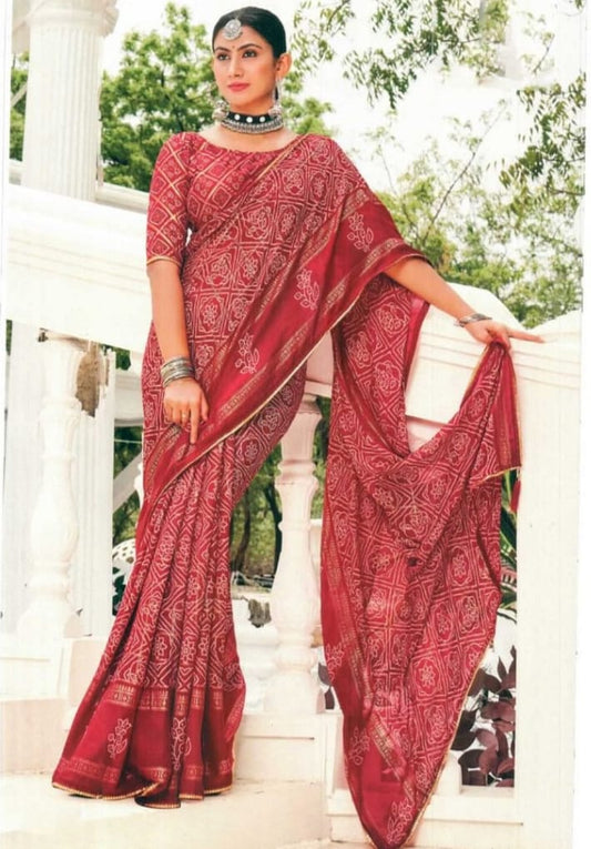 Luxurious silk saree with a pure zari weave and a rich, heavy border.